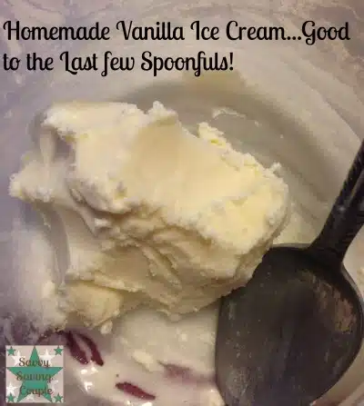 Homemade vanilla ice cream scoop in a bowl with a silver spoon.