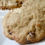 Gluten free chocolate chip cookies on a white plate.