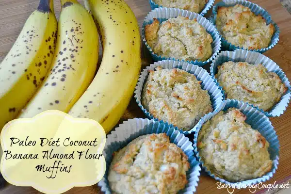 Paleo Diet Coconut Banana Almond Flour Muffins on a wooden cutting board with speckled bananas.