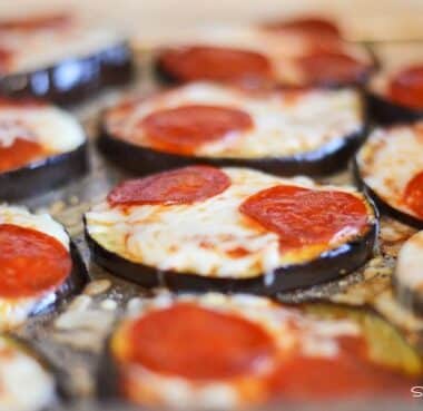Eggplant slices with pepperoni and cheese.
