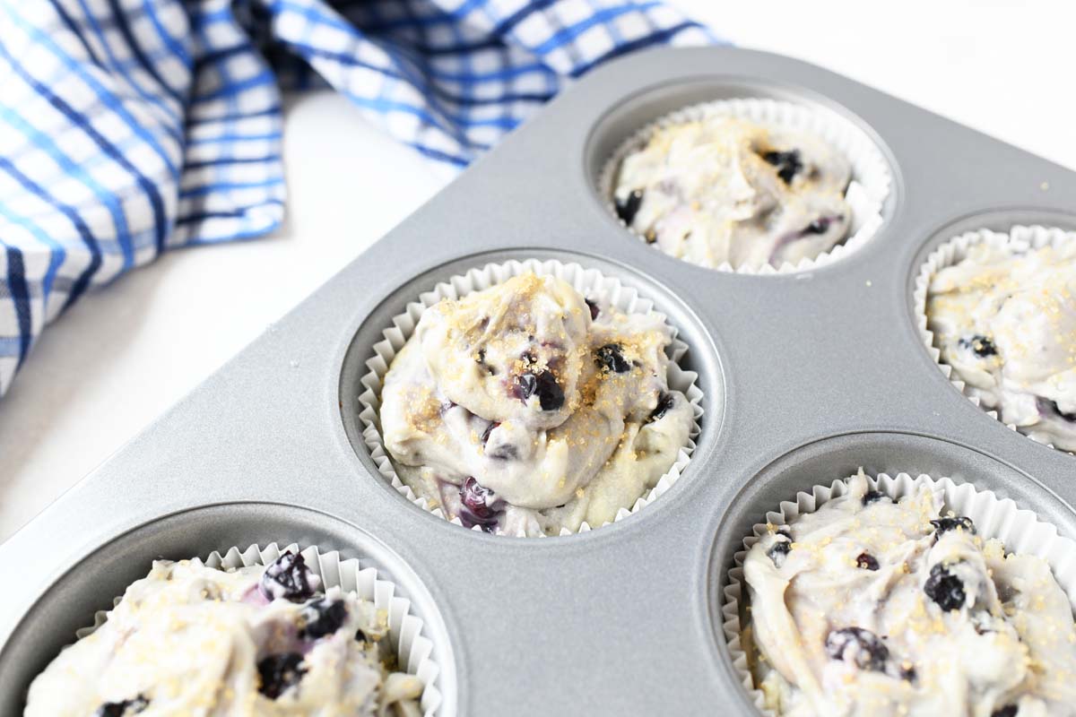 Jumbo blueberry muffin batter in a silver tin.