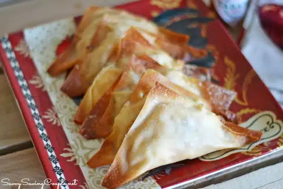 Bufflao chicken wontons on a patterned plate
