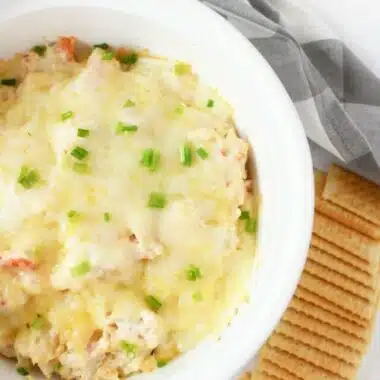 Hot Crab Rangoon Dip in a white oval baker.