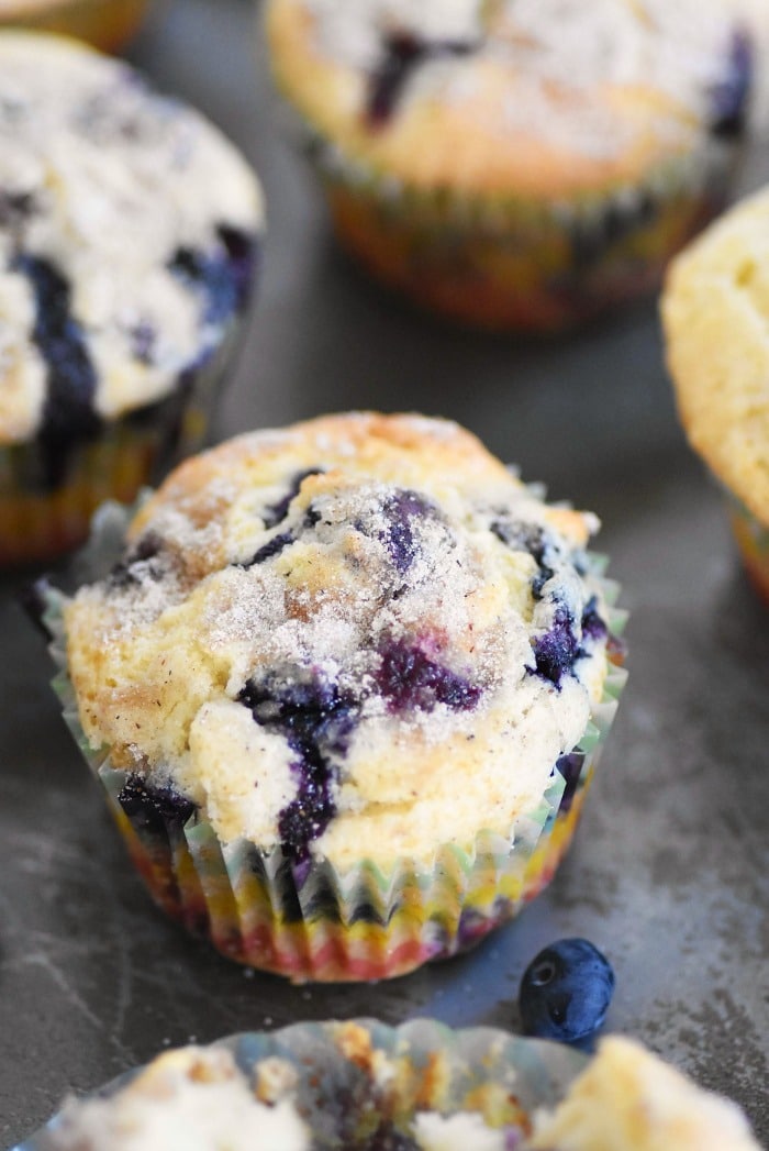 Blueberry Nutmeg and Sugar muffins on baking sheet.