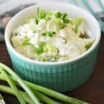 scallion cream cheese in a blue bowl