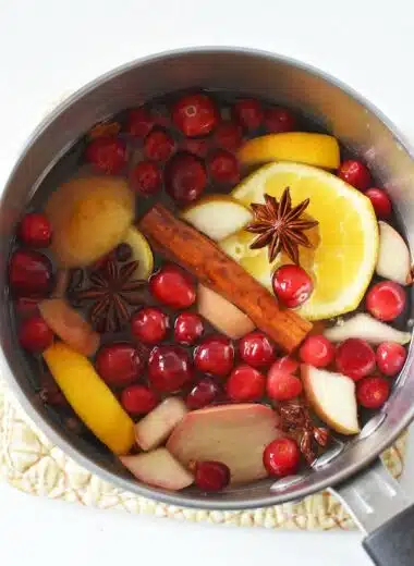 A small stockpot with colorful potpourri ingredients.