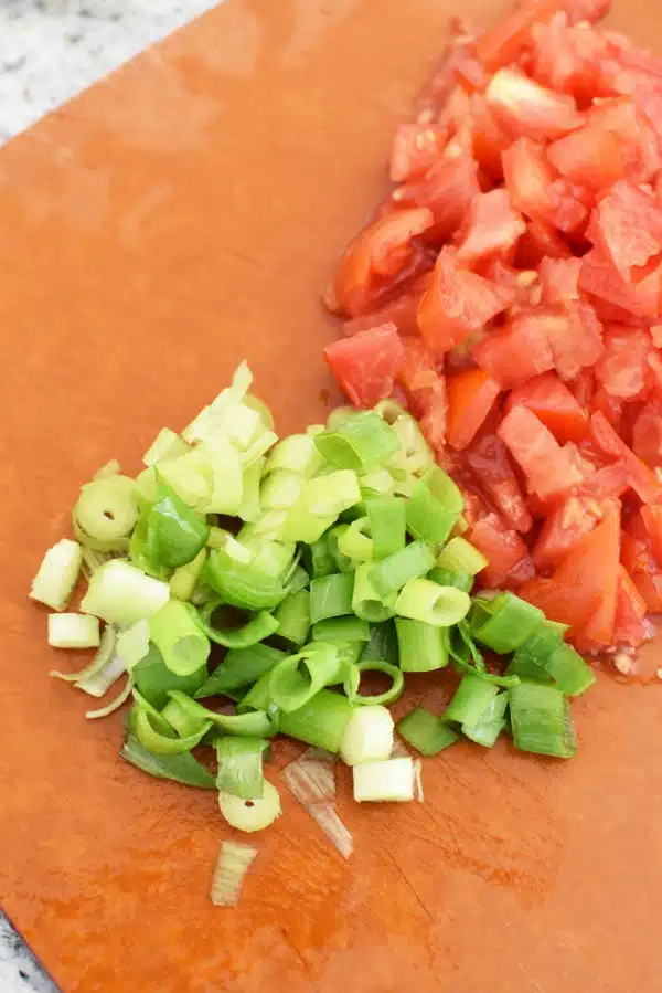 diced green onion and tomato