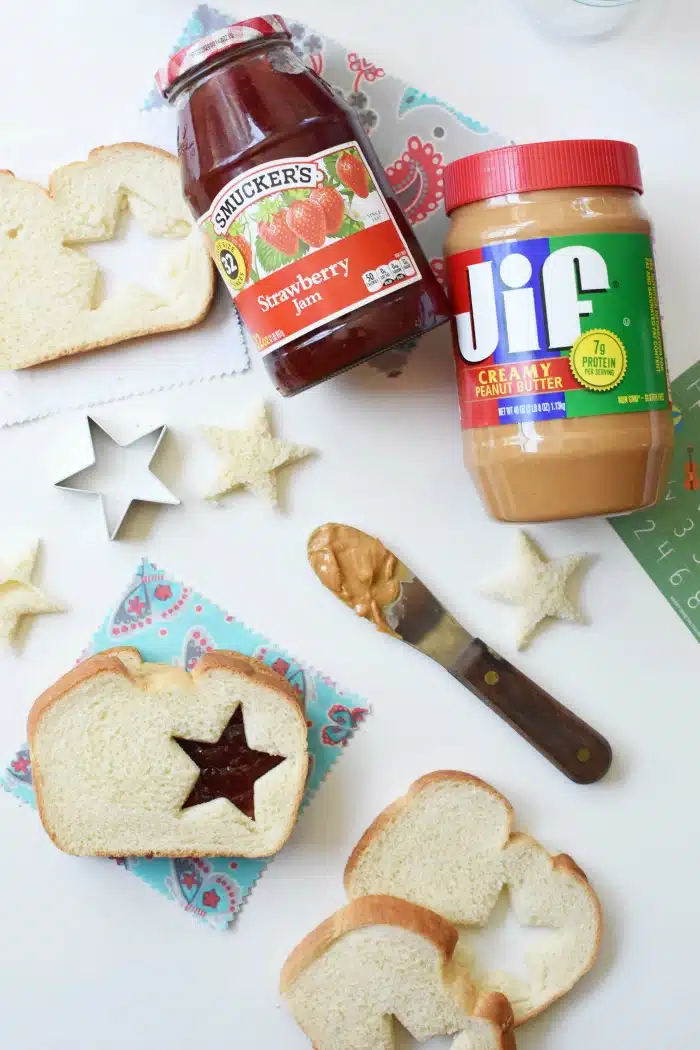 Star Peanut Butter and Jelly Sandwich Cutout with a jar of jelly and jam.