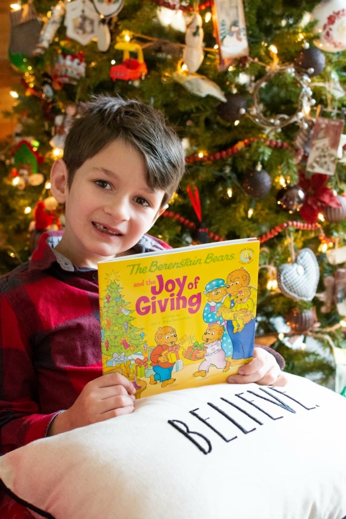 boy with The Joy of Giving book