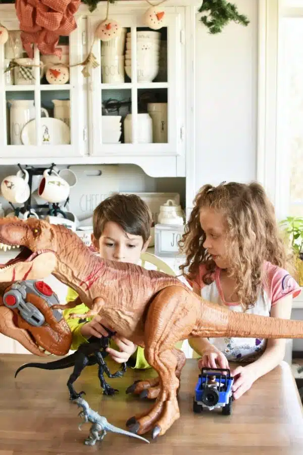 kids with dinosaur toys 1