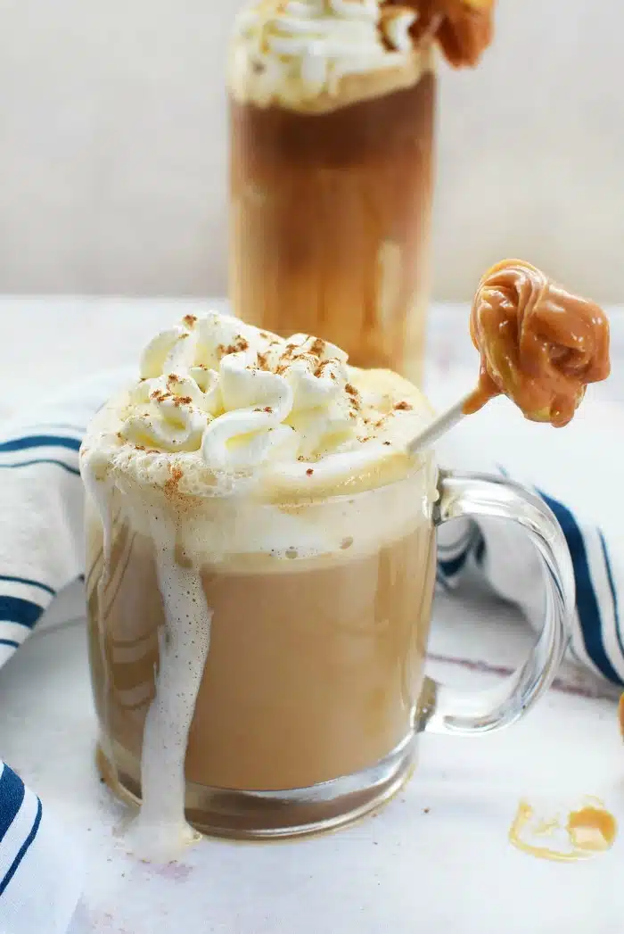 Hot apple latte with caramel apple stirrer 