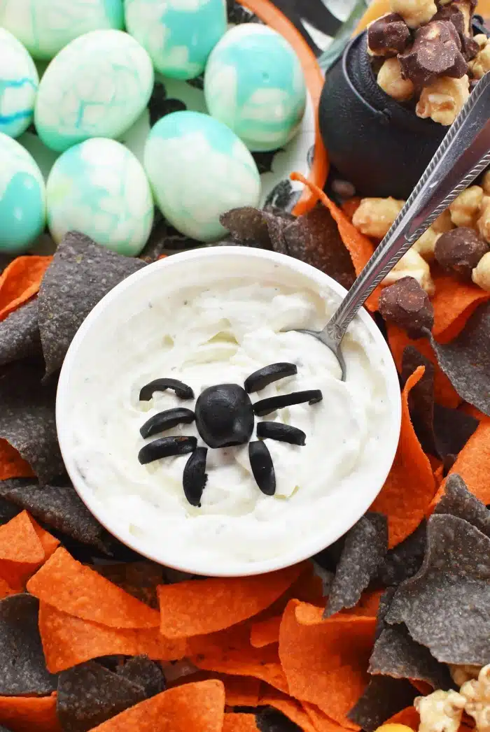Heluva Good Halloween dip with black olive spider. 