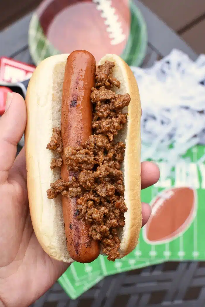 Hot dog with Taco Beef in hand. 