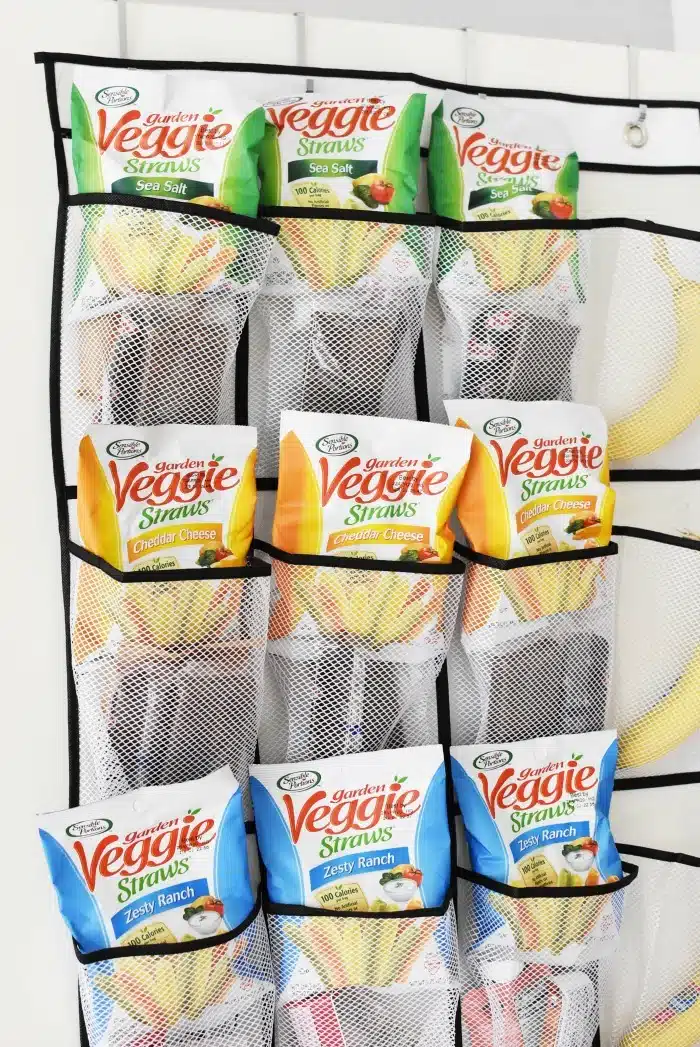 Over the door snacks holder with Veggie Straws sticks.