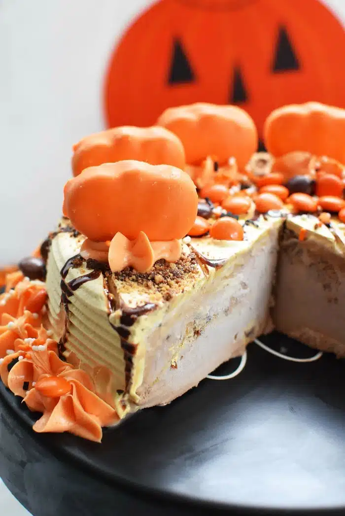 Reeses cake up close with candy pumpkins.