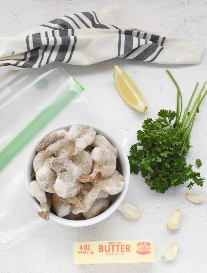 Garlic Butter Shrimp ingredients on a grey table. 