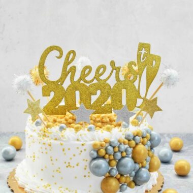 2020 New Year Cake with gold and silver gumballs and star picks.