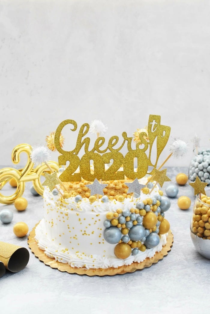 New Years Cake with gold and silver candies. 