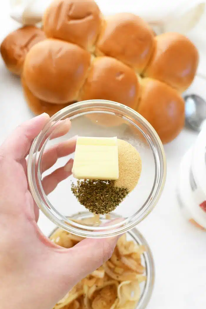 Butter and spices in a glass dish.