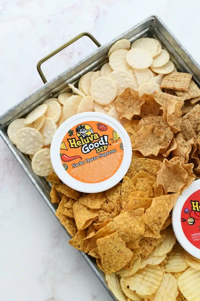 Heluva good chips tray with nacho dip inside. 