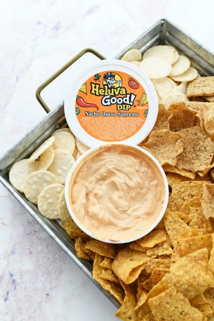 Nacho Queso Supreme Heluva good with lid off near chips. 