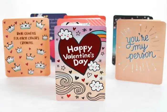 Valentines Day American Greetings Cards on white table standing up. 