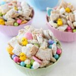 Easter Snack Mix in small, colorful pastel bowls.