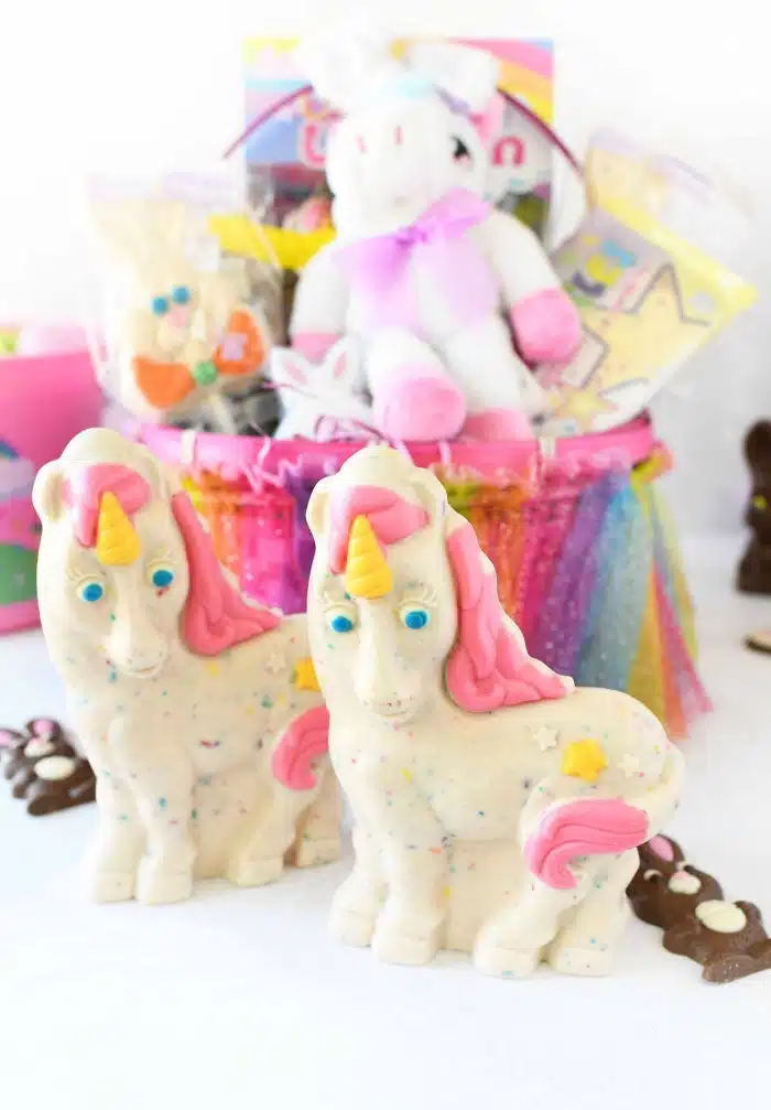 Easter Unicorn candies with unicorn basket in the background. 