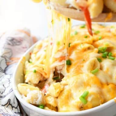 Crab Meat Pasta Casserole with a cheese pull.