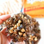 Frosted Mini Spooners No-Bake cookies in a hand.