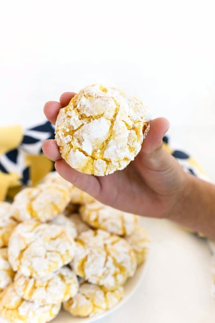 Lemon Cake mix cookie in a kid's hand. 