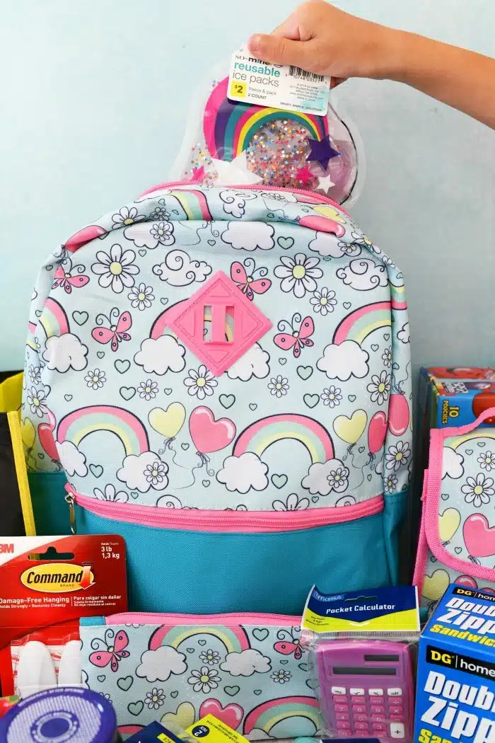 Dollar general school supplies in a blue back pack.
