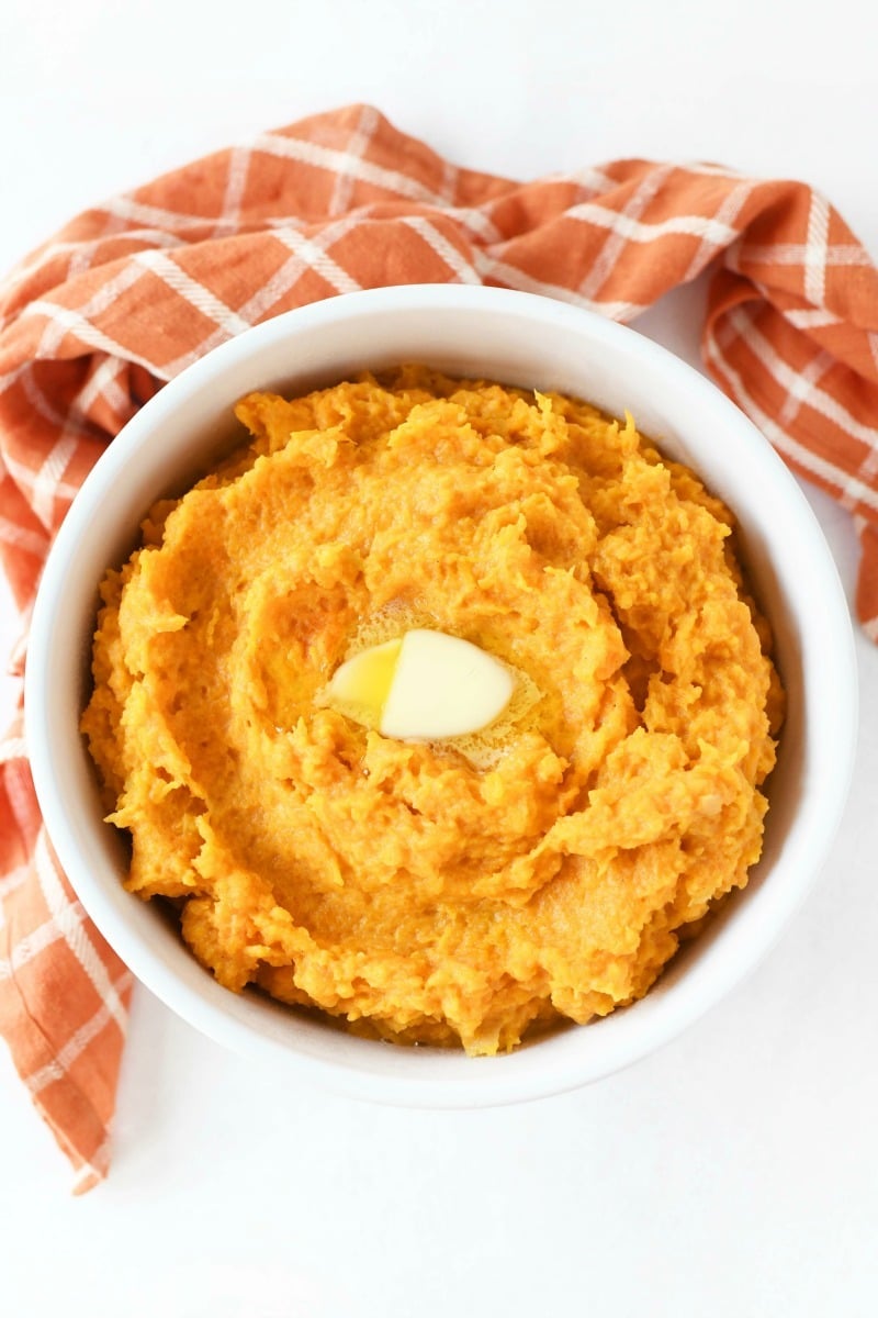 Mashed Butternut with sour cream and an orange plaid napkin.