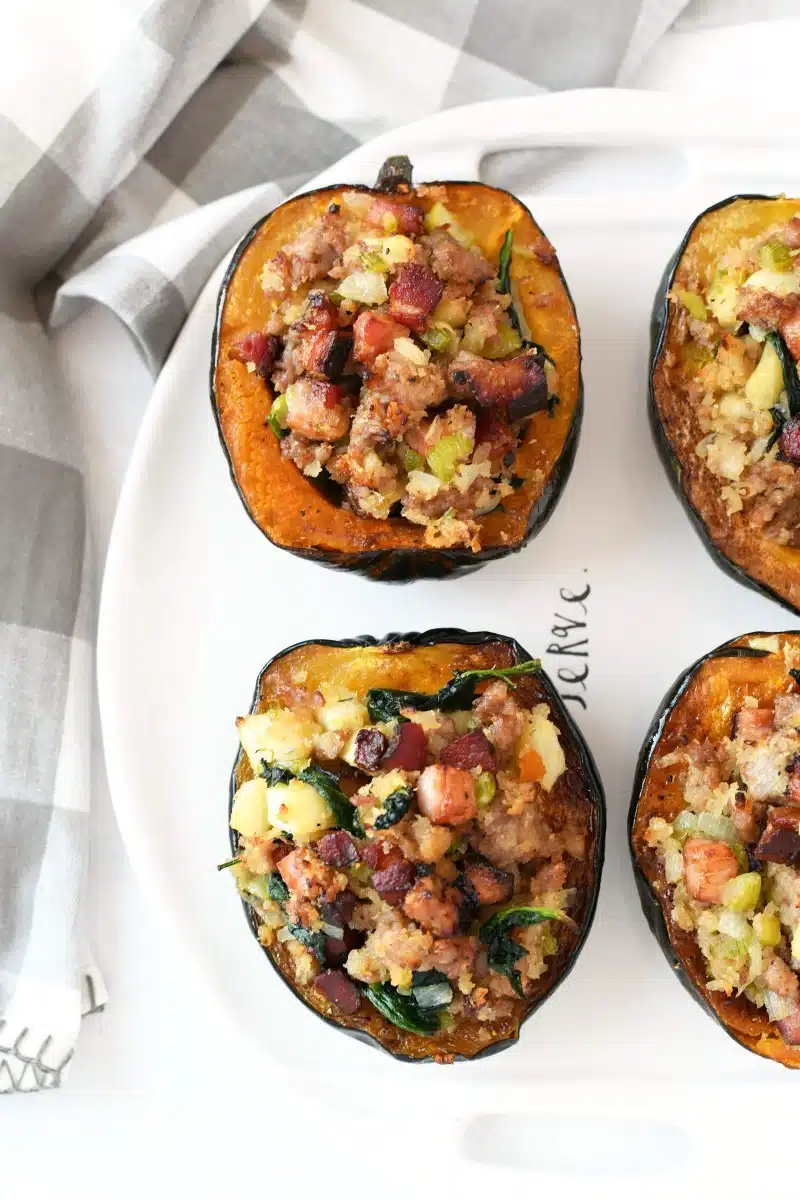 Twice Baked Acorn Squash on a white oval tray.