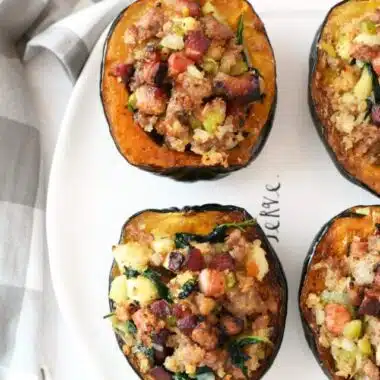 Twice Baked Acorn Squash on a white oval tray.