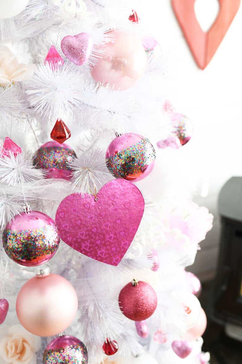 Pink Hearts tree with pink foil hearts on a white tree. 