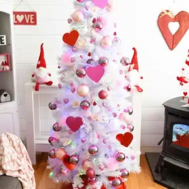 Pink & Red Valentine's Day Tree in a farmhouse style living room. The tree is white with pink and red ornaments.