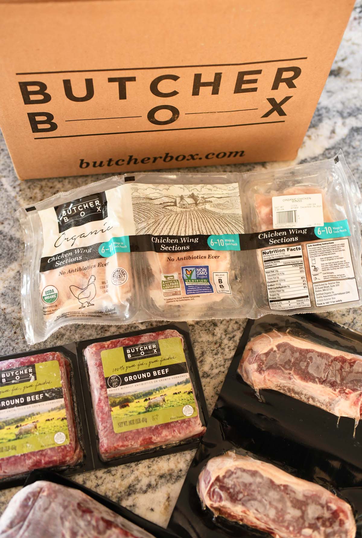 Inside a Beef Butcher Box with meat contents on a counter. 