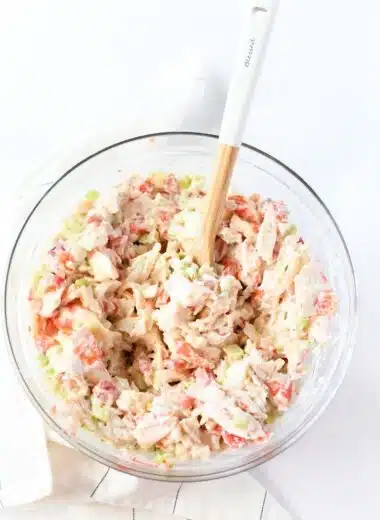 Zesty Seafood Salad in a bowl with a spoon.