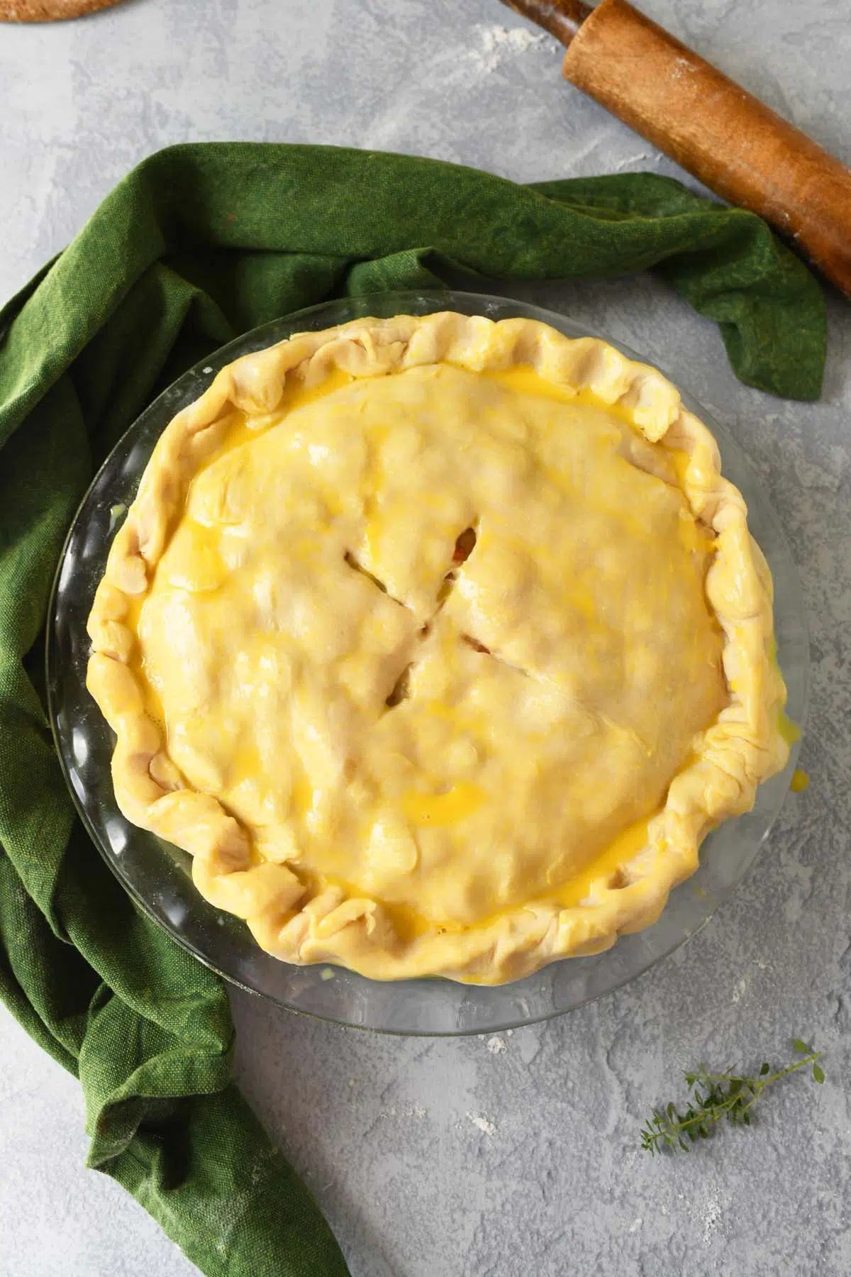 A pie crust coated with and egg wash.