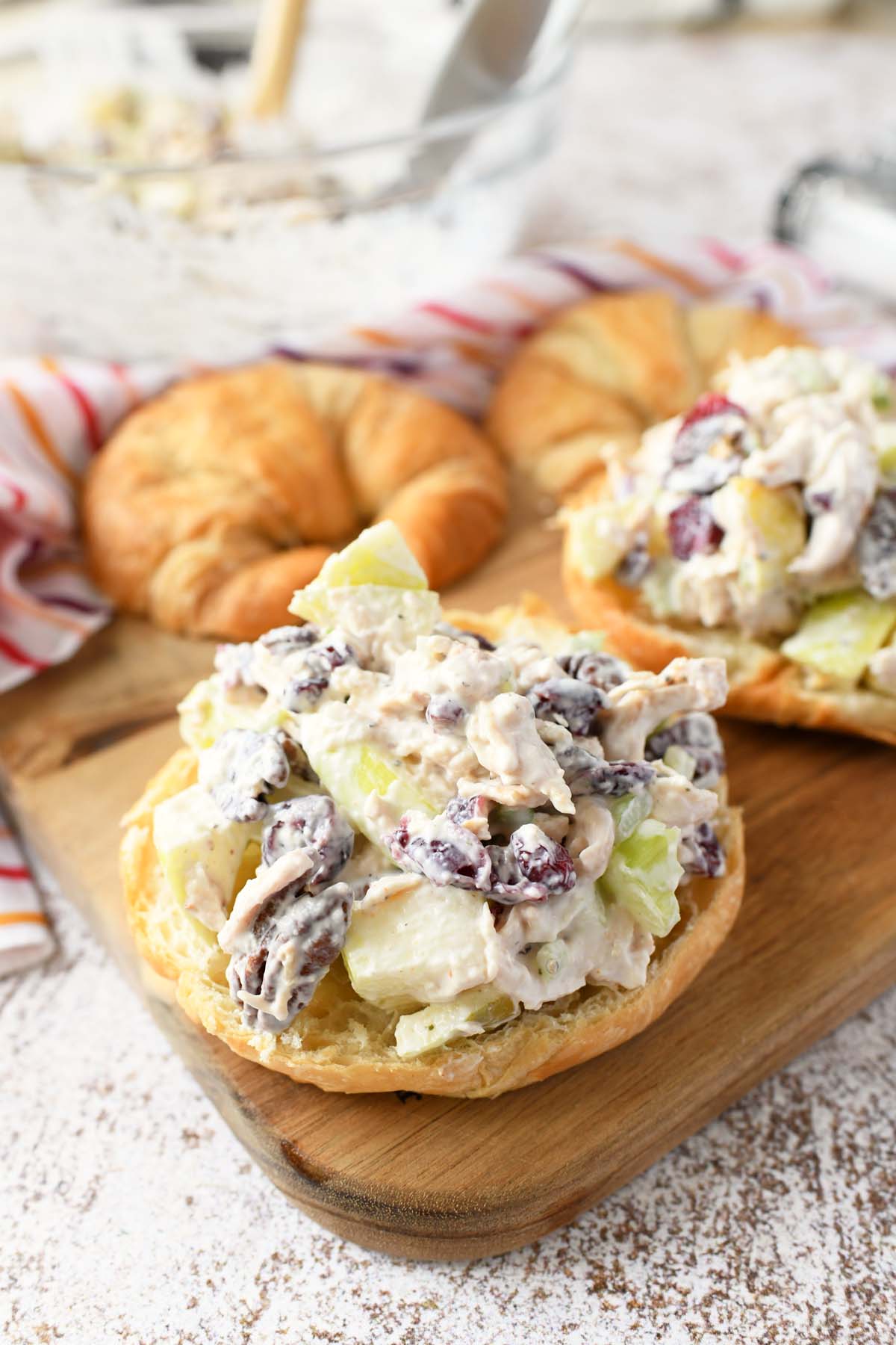 Chicken salad on a golden croissant. 