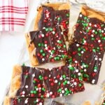 Ritz Toffee Candy Bar cut into squares on foil.