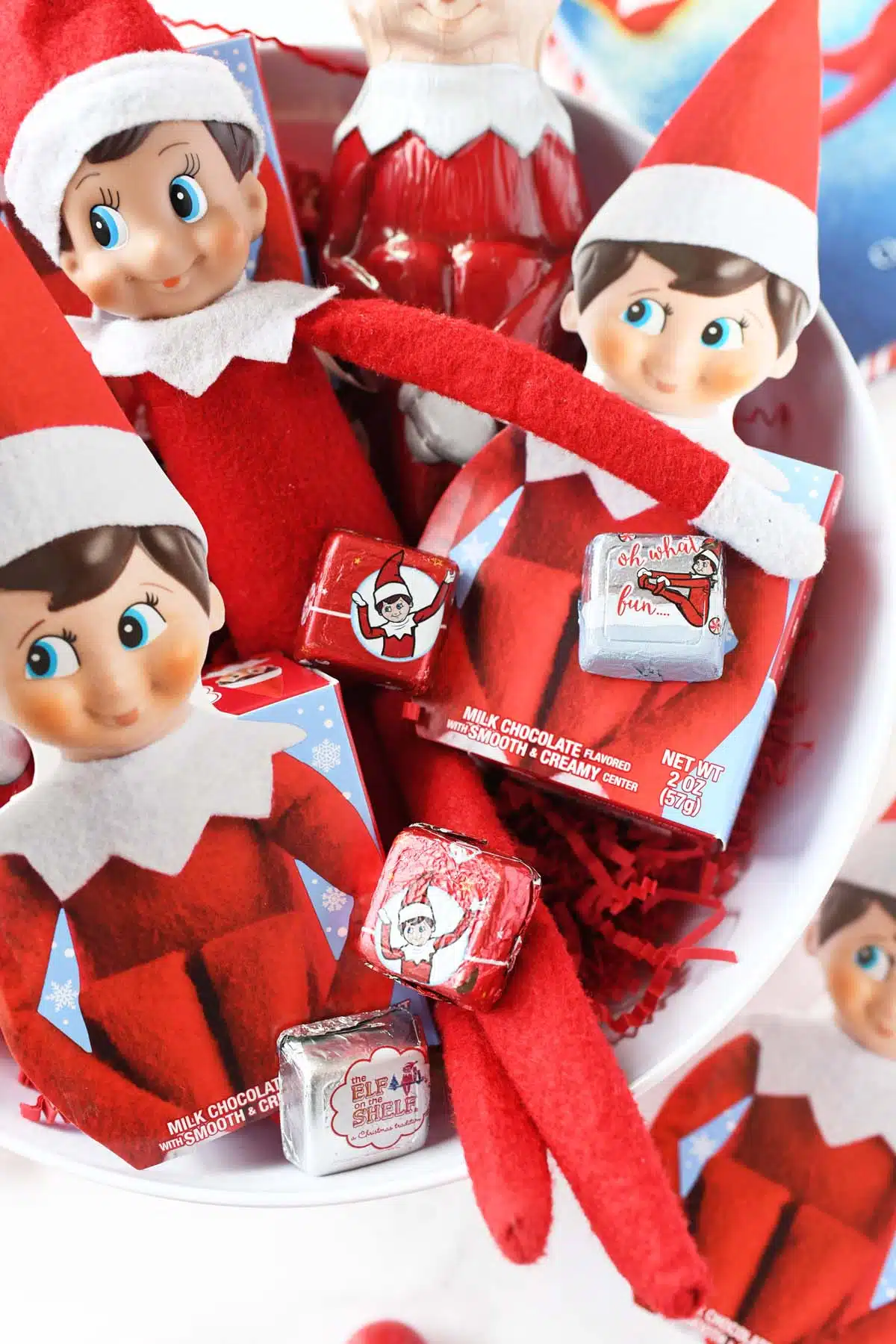 Elf on the shelf candy in a red bowl.