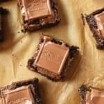 Ghirardelli caramel brownies on brown wax paper.