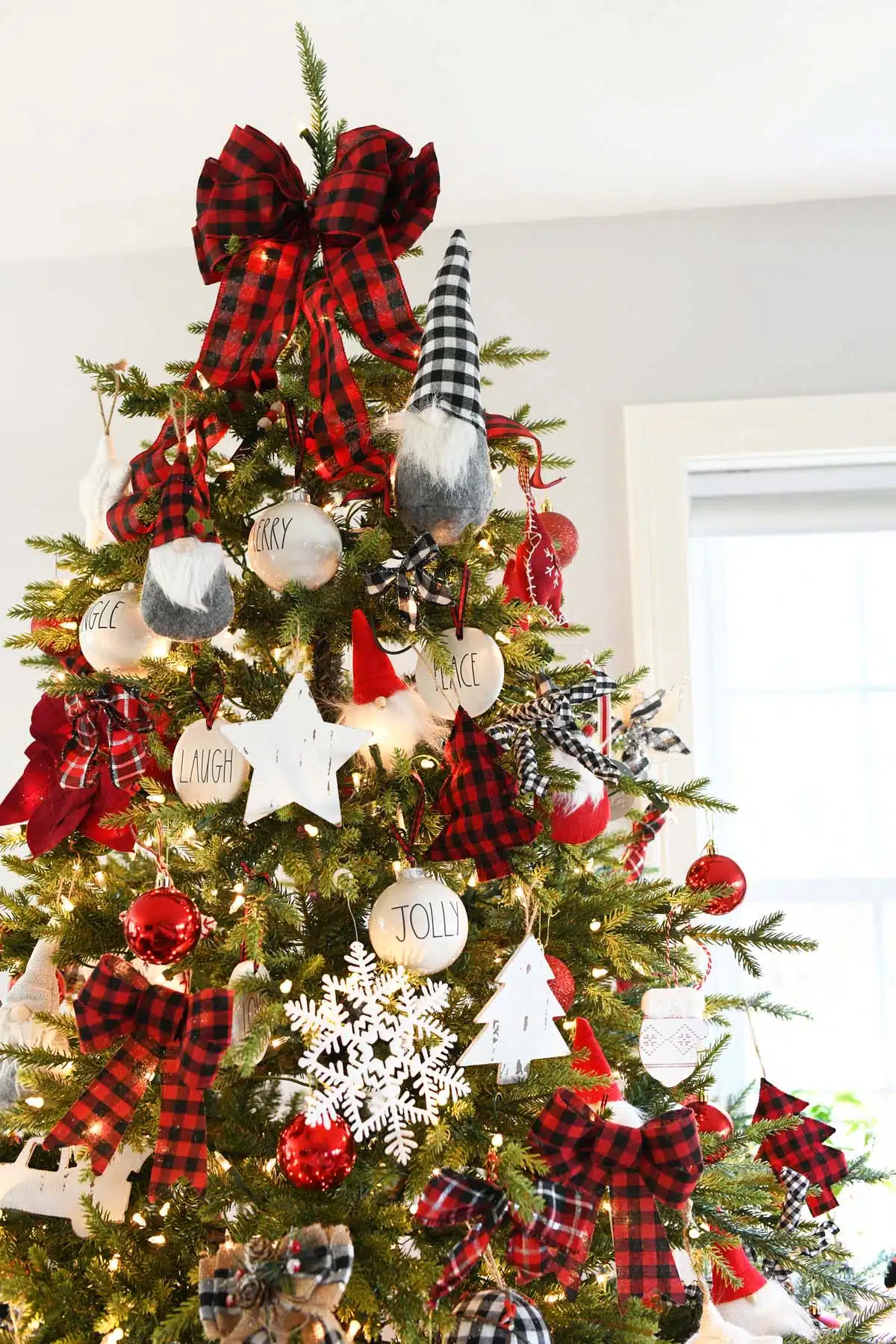 Plaid Farmhouse Gnome Tree with red and white decor.