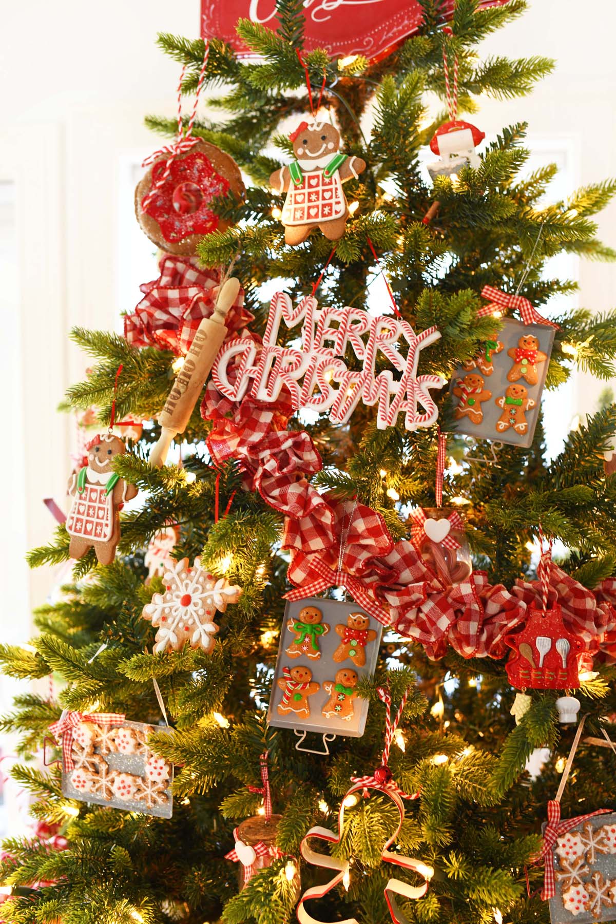 Red Gingham Tree tree garland on a baking Christmas tree.