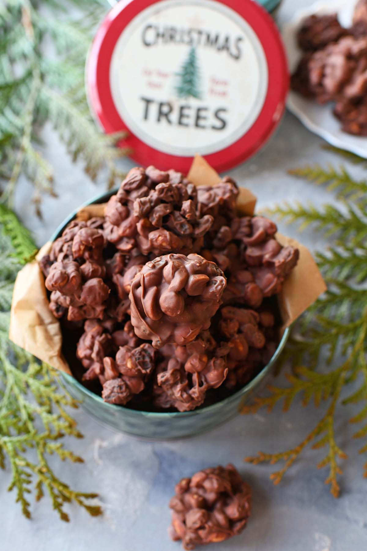 Raisin and Milk chocolate clusters in a small holiday gifting tin.