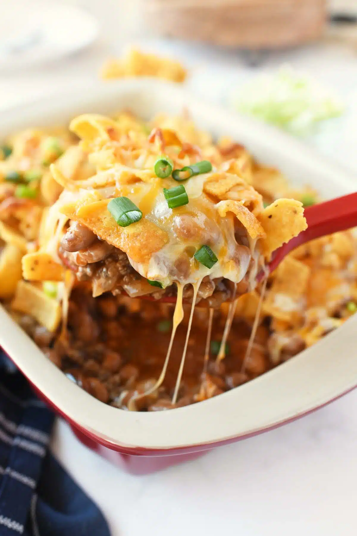 Corn Chip Mexican Casserole with melty cheese.