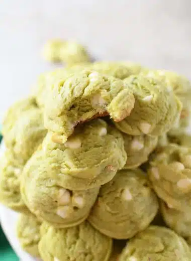 Pistachio Cookie with a bite taken out of it.