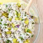 Tuna pasta salad with dill pickles.